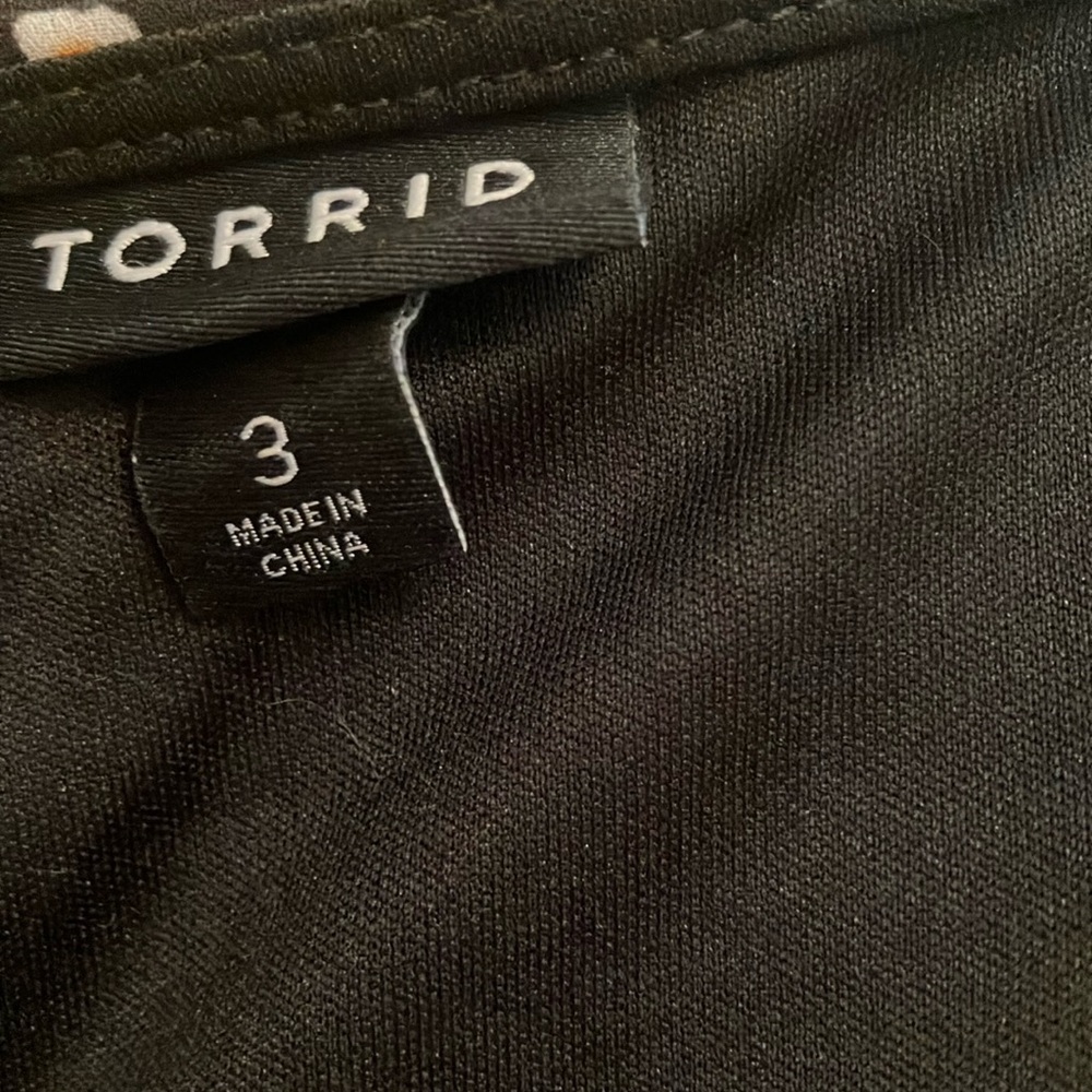 Black Torrid dress with fabric belt and pockets.